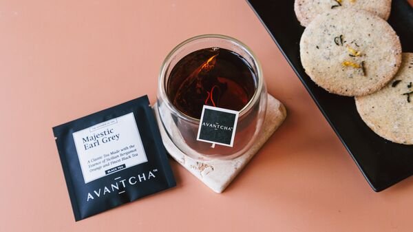 Sachet thumb — silk teabag with cup and cookies