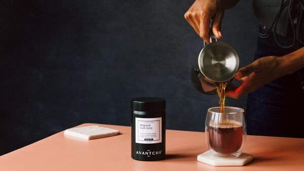 Pouring thumb — kettle pour into glass cup